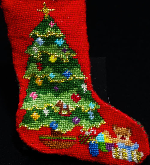 Close-up of the petit point Christmas tree stitching on silk gauze